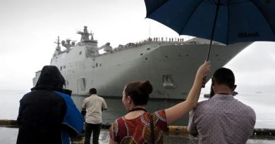 Local media greet HMAS Canberra at the Port of Suva, Fiji. Photo by Commander Ben MacDonald