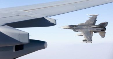 A 480th Fighter Squadron "Warhawks" F-16C flies alongside after refuelling from a KC-30A Multi-Role Tanker Transport air-to-air refuelling aircraft over the Middle East Region. Photo by Corporal Nicci Freeman