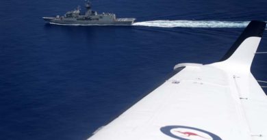 A Royal Australian Air Force KA350 King Air aircraft flies past HMAS Anzac in the South China Sea during Exercise Bersama Shield 16. Photo by Corporal Steve Duncan