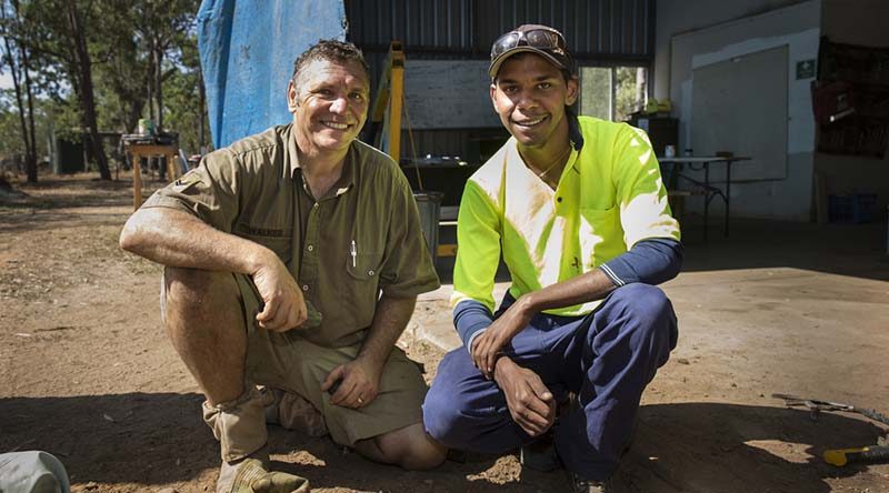 Australian Army plumber Corporal Terry Walker (left), who is an Indigenous liaison officer for the Army Aboriginal Community Assistance Programme in Laura, northern Queensland, is working with local Mr Kendall Bowen to mentor and pass on his skills. Photo by Sergeant Janine Fabre