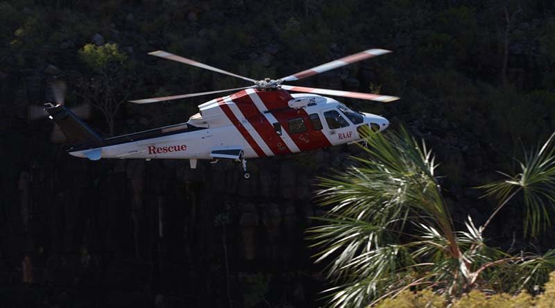 A CHC Helicopter SAR helicopter performs a training flight through a gorge in the Katherine region. CHC Helicopters (Australia) provides a search-and-rescue response to all ejection-seat fitted aircraft serving in the RAAF – and now also for major Army exercises. The helicopters are based at RAAF Bases Tindal, Pearce, East Sale, Williamtown and Amberley. Photo by Corporal Terry Hartin.