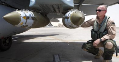 Commander Air Task Group, Air Commodore Philip Gordon, conducts pre-flight checks on an F/A-18A Hornet prior to departing on a mission out of Australia's main air operating base in the Middle East region. This image has been digitally modified. Photo by Corporal Nicci Freeman