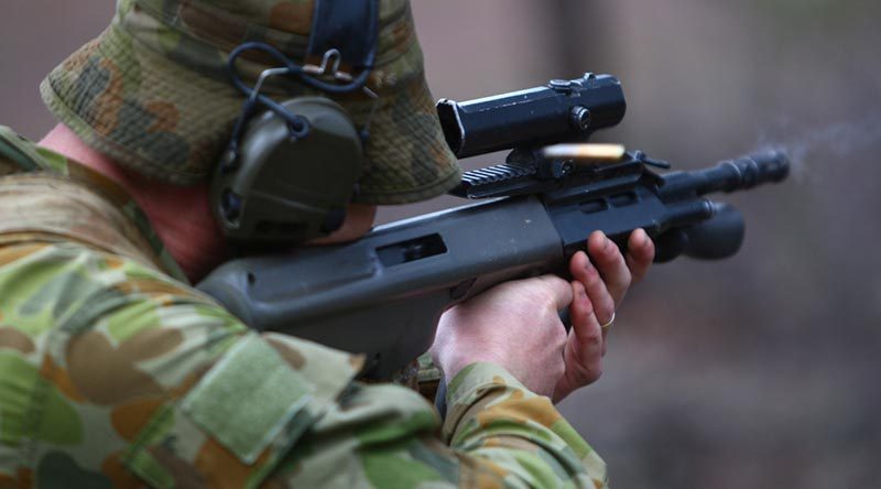 An Australian soldier engages targets at Puckapunyal during Exercise Southern Jackaroo 2014.