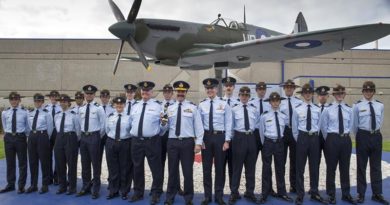 Chief of Air Force Air Marshal Leo Davies poses with RAAF Cadets after unveiling a Spitfire MK VIII LF replica, A58-492 at the RAAF Museum at Point Cook, Victoria. Photo by Flight Lieutenant Robert Palmer