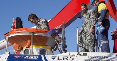 Simulated casualty volunteers enter the LR5 Sub Rescue Vessel to be transferred to HMAS Dechaineux during Ex Black Carillon 2016. Photo by Leading Seaman Bradley Darvill.