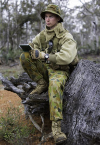 Australian Army Cadets trainee Cadet Corporal David Baker, from 504th Army Cadet Unit, writes his orders in his field notebook during the annual field exercise in Bindoon training area, north-east of Perth, on 1 October 2016.