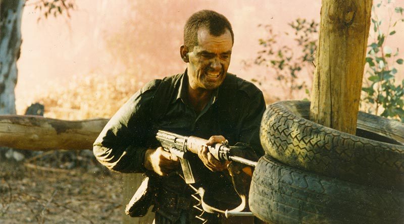 CONTACT Editor Brian Hartigan on the bayonet assault course, 1990.
