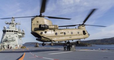 An Australian Army CH47F Chinook hovers over HMAS Adelaide's flight deck during first-of-class flight trials. Photo by Petty Officer Paul McCallum.