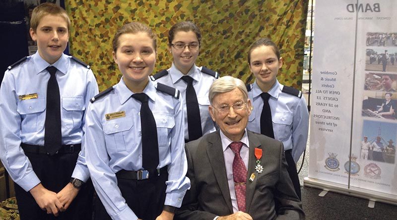 WWII Warrant Officer and Knight in the French Légion d’Honneur Doug Leak visits (left to right) Cadet Simon Russell (604 Squadron), Cadets Kelly and Emma Parkin (613 Squadron), and Cadet Samantha Stevens (609 Squadron) at the AAFC stand at the Royal Adelaide Show.