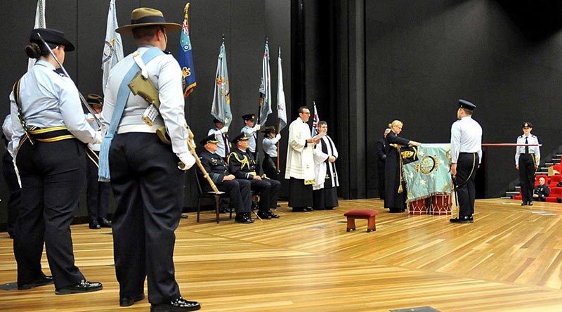Australian Air Force Cadets, staff, senior RAAF officers, families and supporters witness Air Vice Marshal Peter Yates present a Governor-General's Banner to the Australian Air Force Cadets, at ADFA, in recognition of 75 years continuous community service. The Governor-General was in Israel for a State Funeral.