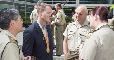 Australian Army soldier and 2016 Paralympic Games gold medallist Sapper Curtis McGrath chats to Army HQ staff during a morning tea at Russell Offices, Canberra, on 6 October 2016. Photo by Sergeant Mick Davis.