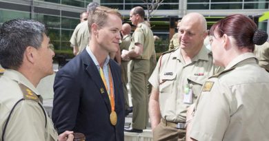 Australian Army soldier and 2016 Paralympic Games gold medallist Sapper Curtis McGrath chats to Army HQ staff during a morning tea at Russell Offices, Canberra, on 6 October 2016. Photo by Sergeant Mick Davis.