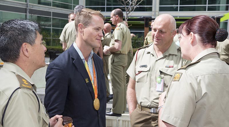 Australian Army soldier and 2016 Paralympic Games gold medallist Sapper Curtis McGrath chats to Army HQ staff during a morning tea at Russell Offices, Canberra, on 6 October 2016. Photo by Sergeant Mick Davis.