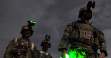 Members of Australia's Special Operations Task Group (SOTG) prepare to fly into Oruzgan's Baluchi Valley and Chora regions in support of an MTF1 mission, in 2010. Photo by Lieutenant Aaron Oldaker.