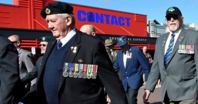 Ray Duthie marches in the 2016 Murray Bridge Vietnam Veterans Day parade (photo digitally altered to insert CONTACT ad)