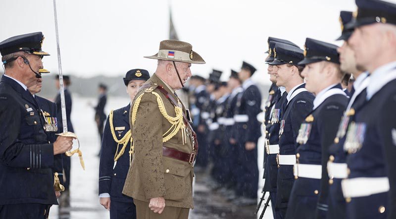 Governor-General Sir Peter Cosgrove talks to a RAAF member during a parade to mark the Centenary of Numbers 1, 2, 3 and 4 Squadrons. Photo by Corporal Nicci Freeman.