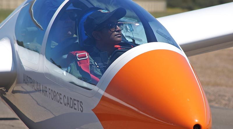 Leading Cadet Tharane Thamodarar, 604 Squadron, Hampstead Barracks, prepares for takeoff. Leading Cadet Thamodarar is the recipient of an Air Force Flying Scholarship, allowing her to develop her gliding skills and reach solo pilot status. Her gliding activities also contribute to her Bronze Award within the Duke of Edinburgh International Award Scheme.