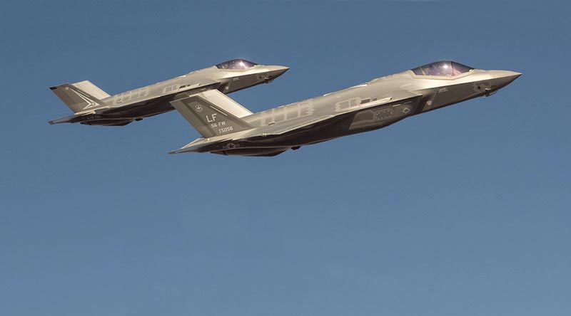 A Royal Australian Air Force F-35A flies in formation with a US Air Force F-35 during trial flights from Luke Air Force Base in Phoenix Arizona. Lockheed Martin photo by Matthew Short (digitally altered (removed F-16) by CONTACT)