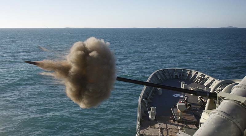 HMAS Perth fires her 5-inch gun during the closing stages of exercise Talisman Saber 2013. Photo by Leading Seaman Yuri Ramsey