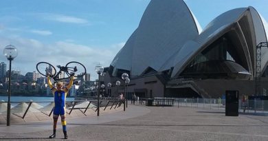 Laurie ‘Truck’ Sams celebrates reaching the Sydney Opera House at the end of an epic 10,200km bike ride – The Long Ride Home – from Hanoi, Vietnam. Photo by CONTACT 'roving reporter' Sue Monckton.