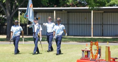 Banner Bearer Cadet Under Officer Hayden Skiparis, with Banner Warrant Officer Cadet Sergeant Joshua Watson and Banner Escorts Cadet Corporal Suyash Jain and Cadet Corporal Michael Santos proudly march on the Banner of No 6 Wing AAFC. Photo by Pilot Officer (AAFC) Paul Rosenzweig.