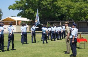 No 604 Squadron Cadets conduct a march past and ‘Eyes Right’, and receive salutes from the Reviewing Officer, Major Jim O’Hanlon, Second in Command Adelaide University Regiment, and Commanding Officer of 604 Squadron, Flying Officer (AAFC) John Bennett.