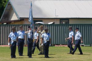 Parade Commander Cadet Under Officer Aaron Musk and Reviewing Officer Major Jim O’Hanlon, Second in Command Adelaide Universities Regiment, salute as they pass the Banner of No 6 Wing AAFC.