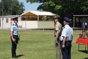 Parade Commander, Cadet Under Officer Aaron Musk, salutes the Reviewing Officer, Major Jim O’Hanlon, Second in Command of the Adelaide Universities Regiment and invites him to inspect the Squadron.