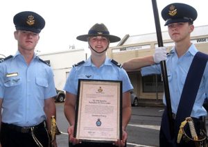 Parade Commander Cadet Under Officer Aaron Musk, Scroll Bearer Cadet Corporal Casey Dibben and Banner Bearer Cadet Under Officer Hayden Skiparis.