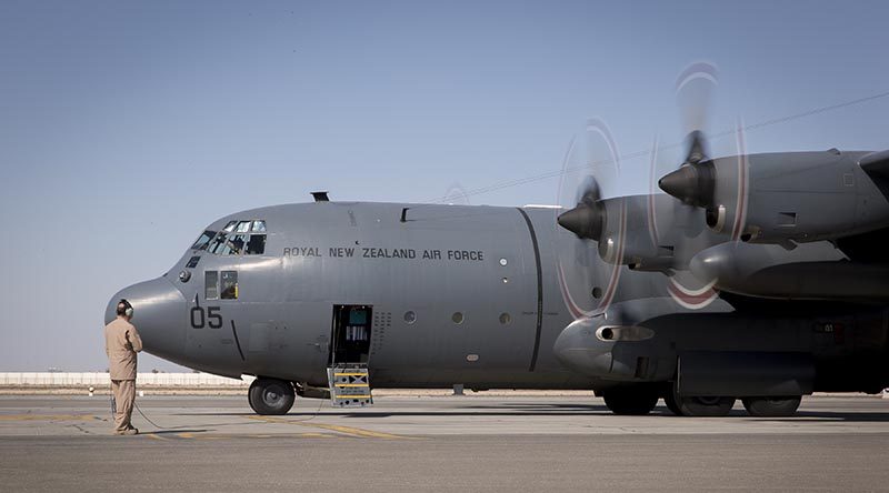 Royal New Zealand Air Force Sergeant Dave Wood an Air Loadmaster carries out start up procedures of the C- 130 prior to a task on OP TEAL.