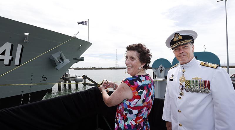 Mrs Robyn Shackleton, wife of former Chief of Navy and Commanding Officer of HMAS Brisbane II, Vice Admiral David Shackleton (retired), was guest of honour and launching lady, sending the destroyer on her way with the traditional toast and smash of a bottle. Photographer unknown, via Navy Daily.