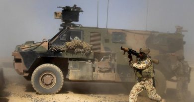 A 1RAR soldier dismounts a Bushmaster equipped with a protected weapon station [or system? – let me know ASAP if I'm wrong] (PWS) to fire the 84mm rocket launcher. Photo by Corporal Jamie Osborne.