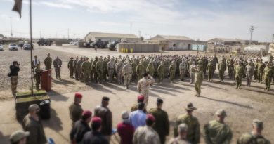 Commander Task Group Taji Colonel Andrew Lowe salutes Deputy Commander Training - Combined Joint Forces Land Component Command, Operation Inherent Resolve, Brigadier General Francesco Ceravolo at the Task Group Taji 3/4 transfer of authority parade at the Taji Military Complex in Iraq. Photo by Leading Seaman Jake Badior.