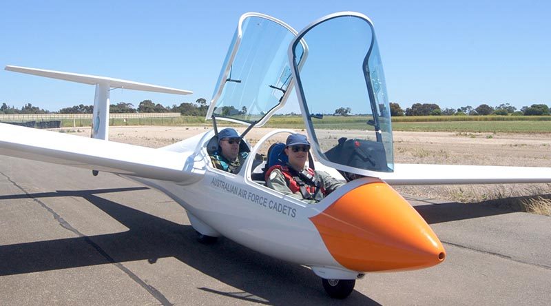 Cadet Corporal Ian Van Schalkwyk, No 617 Squadron, Unley, about to take off in an ASK-21 Mi two-seater glider at Gawler airfield in South Australia, with 600 Squadron’s Chief Flying Instructor–Gliding, Pilot Officer (AAFC) Dennis Medlow.