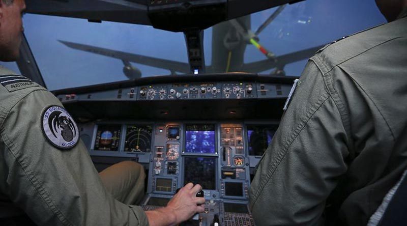 An real-life RAAF KC-30A flight crew prepares to take 'virtual fuel' from a virtual KC-30A fuel boom, which is actually being operated by a real-life fuel-boom operator somewhere else in the world. Northrop Grumman's distributed network environment will eventually allow real-life air crews flying any aircraft-type simulator anywhere in the real world to interact with other aircraft-type crews in a virtual world. Kind of like a global virtual game simulator, but with 'real' aircraft and real crews.