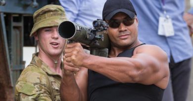 Private Marc Taylor from Rifle Company Butterworth rotation 116 briefs Menden Mahe from Mendens Demolition on the M3 Carl Gustav rocket launcher at Gurun Field Firing Range in Malaysia. Photo by Corporal Nunu Campos.