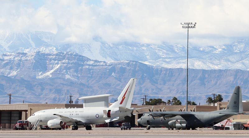A Royal Australian Air Force E-7A Wedgetail and C-130J Hercules on the flightline at Nellis Air Force Base. Photo by Eamon Hamilton.