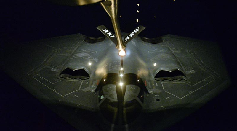 A KC-135 Strantotanker refuels a B-2 Spirit during a mission to bomb ISIL training camps in Libya. US Air Force photo by Staff Sergeant Kate Thornton.