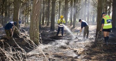 NZDF file photo: RNZAF Base Ohakea Fire Fighters putting out a smouldering fire in Raumai Air Weapons Range. The BCF (Base Contingency Force) assisted in turning over the soil to help cool down the area to stop the spread of the fire.