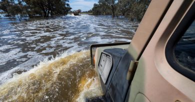 An Australian Army Unimog from 5th Brigade drives through flood waters during a mission to deliver sandbags to a NSW farmer. Photo by Corporal David Said.