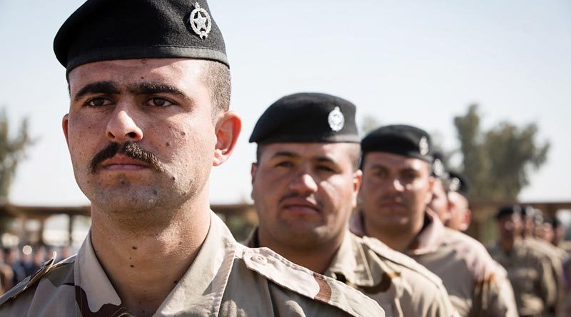Iraqi Ninewah Police during their graduation ceremony after training with Task Group Taji 4 at the Taji Military Complex, Iraq. Photo by SPC Chris Brecht, US Army.