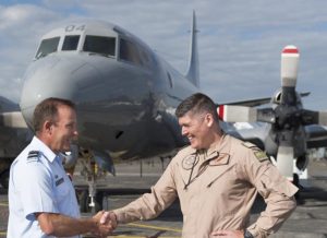 Air Vice-Marshal Tony Davies farewells Wing Commander Daniel Hunt at RNZAF Base Whenuapai.