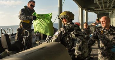 HMAS Arunta personnel account for illegal narcotics they seized in the Middle East. Photo by Able Seaman Steven Thompson.