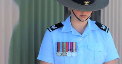 Cadet Sergeant Casey Dibben (No 6 Wing AAFC) wears the medals of her maternal great-grandfather Private Geoffrey Whiteman (6th Australian Division Workshops AIF).