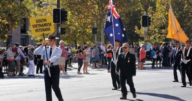 Cadet Flight-Sergeant Jake Dippy prepares to lead the contingent of South Vietnamese veterans in the 2016 Anzac Day March in Adelaide.