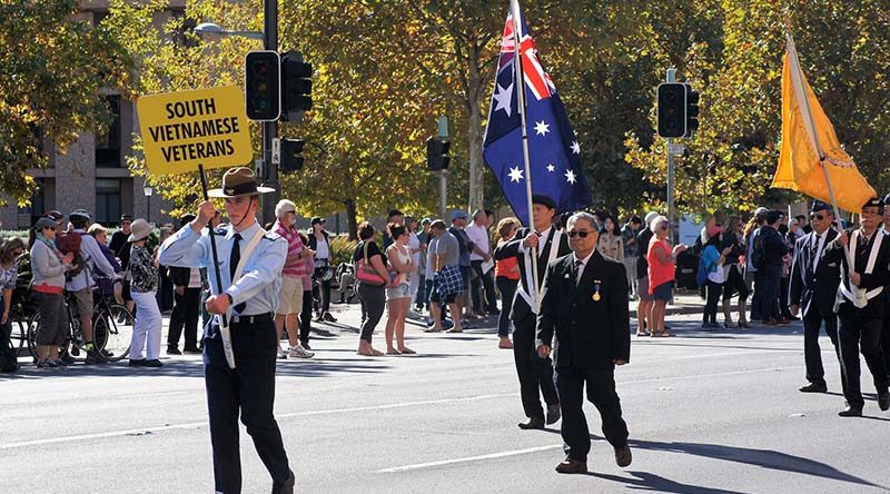 Cadet Flight-Sergeant Jake Dippy prepares to lead the contingent of South Vietnamese veterans in the 2016 Anzac Day March in Adelaide.