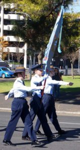 Banner Party of No 6 (City of Adelaide) Wing, AAFC lead the Air Force Cadets contingent in the 2016 Anzac Day March in Adelaide, left to right: Cadet Sergeant Bianca Poppy (now Cadet Under Officer), Cadet Under Officer Andrew Lusher and Cadet Sergeant Kelsey Wurfel (now Cadet Warrant Officer).