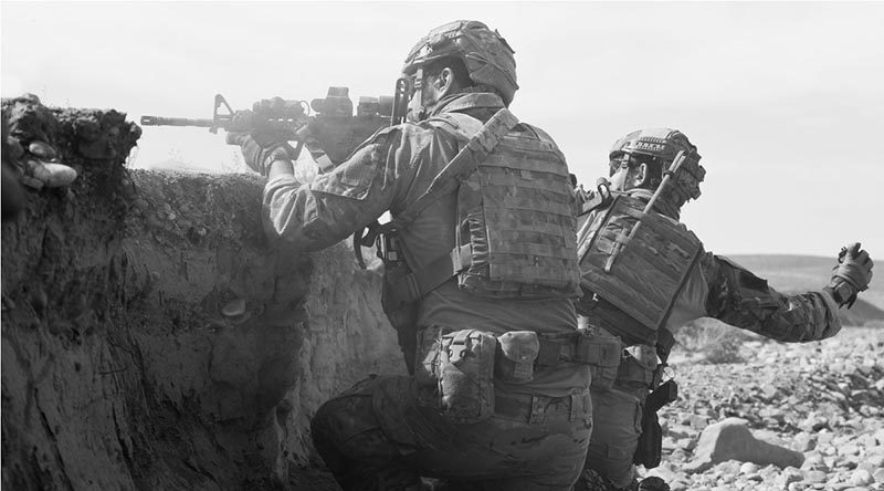 A member of the Special Operations Task Group throws a grenade during a range practise in Uruzgan province, southern Afghanistan. File photo by SOTG.