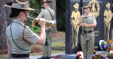 Musician Acacia Cuthbertson, from the Australian Army Band Brisbane, plays the last post at the blessing and dedication of The Royal Australian Regiment Memorial at Ferguson Park, Enoggera on 24 March 2017. Photo by Captain Anna-Lise Rosendahl.