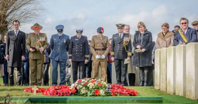 Dignitaries at the burial ceremony of the partial remains of an unknown First World War New Zealand soldier and the partial remains of two British soldiers today at the Perth (China Wall) Commonwealth War Graves Cemetery near Ieper, in Belgium.